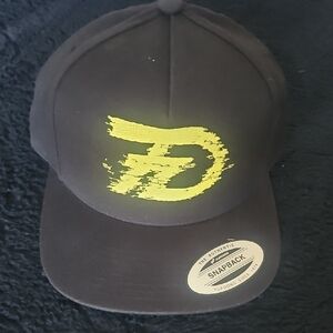 Design: Embroidered yellow "7D" Sevendust logo Hat